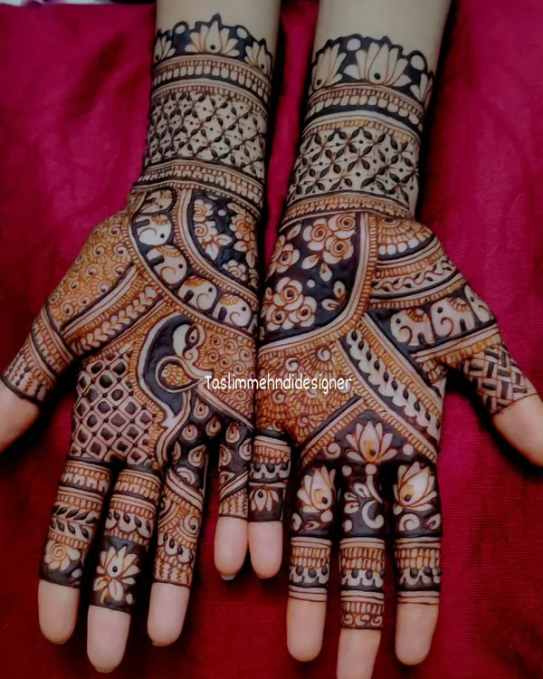 This is the kind of rich, detailed mehndi I love to create. The design is packed with traditional Indian motifs like peacocks and lotuses, with fine lines and a beautiful dark stain that shows the quality of my natural henna paste.