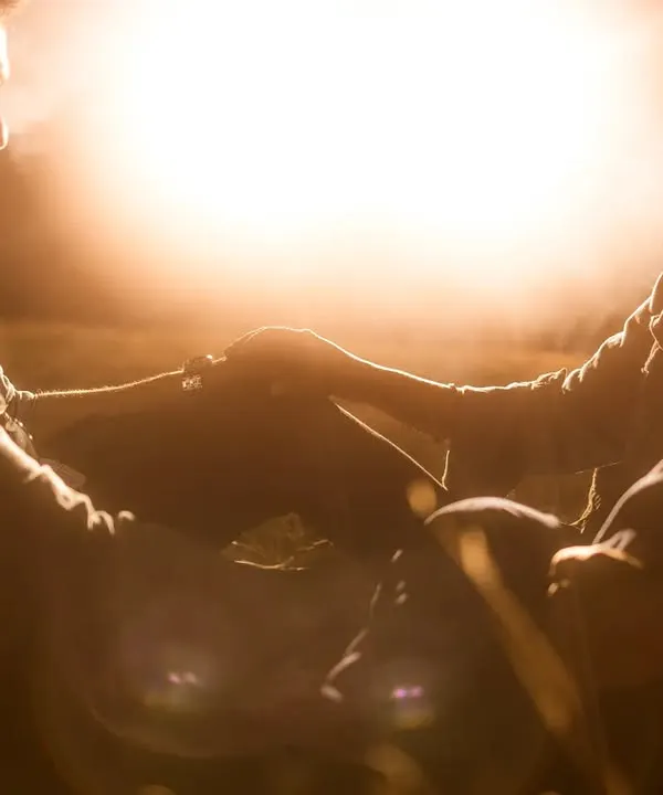 This is the magic I chase. A quiet moment against a blazing sunset, where the world fades away and only the two of you exist. This golden hour silhouette captures the pure, unspoken connection that is the heart of your love story.