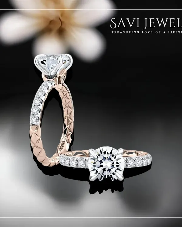 The perfect ring for the biggest day. This stunning solitaire is set on an intricately detailed band of rose gold and diamonds, designed to be a timeless symbol of your commitment.