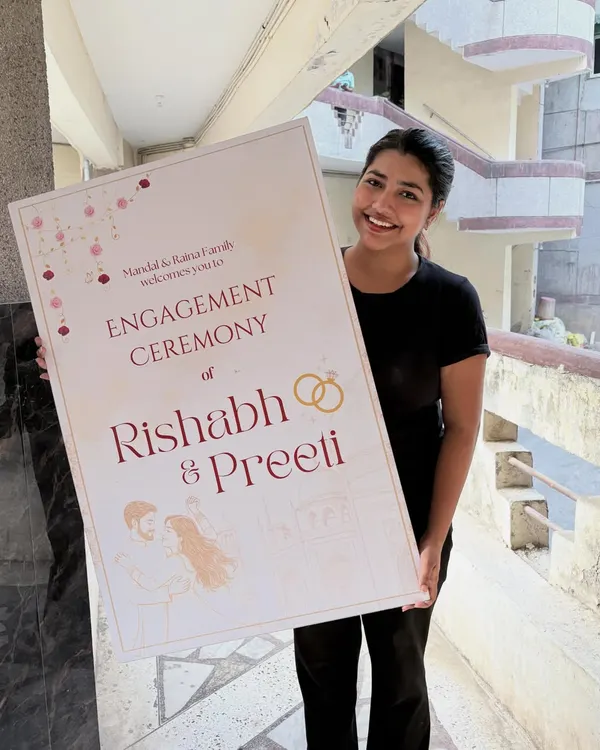 A large, elegant welcome sign is the first thing your guests see. This one, for Rishabh and Preeti's engagement, features their names, a custom illustration, and a warm welcome message for their families.