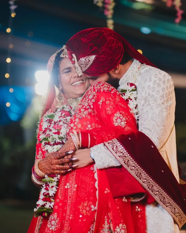A moment of pure, unscripted joy. We live for these candid whispers and radiant smiles that truly define the connection between two people. This is the essence of our photojournalistic approach to wedding photography.
