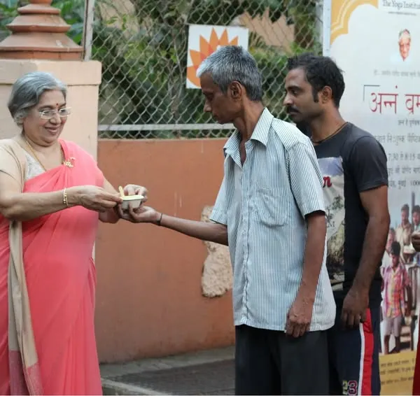 Here I am, sharing a Sattvik meal as part of our Annadan seva. This initiative is rooted in the spirit of the Bhagavad Gita, nurturing health and combating hunger.