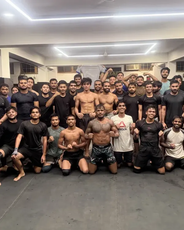 The wrestling squad after a tough session. Sweat, smiles, and a shared sense of accomplishment. This is our tribe.