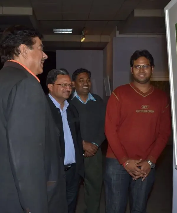 Here I am with the respected actor Shri Shatrughan Sinha, as he admires a photograph of a peacock at my "Jewels of the Wild" exhibition in 2012. It was a great honour to have him visit and appreciate my work.