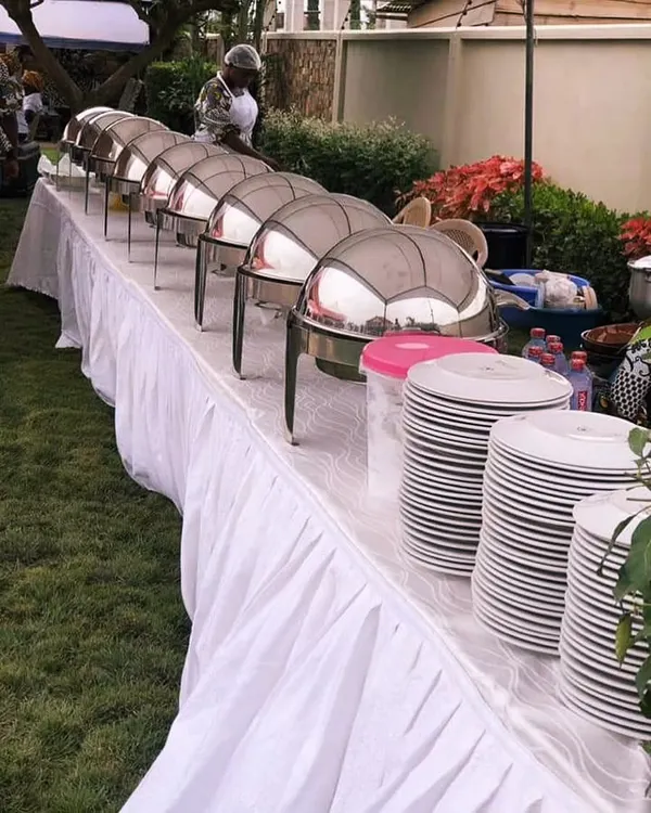 Our classic buffet setup is perfect for any large gathering or wedding. We provide everything from chafing dishes to keep food warm, clean table skirting, and stacks of plates, ensuring a professional and seamless dining experience for your guests.
