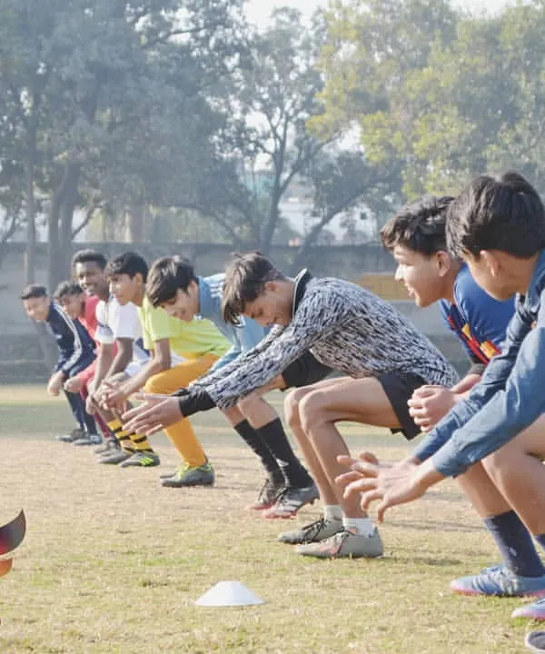 Lined up and ready to go. This is the start of an agility and speed drill, designed to improve our players' reaction time and acceleration on the pitch.