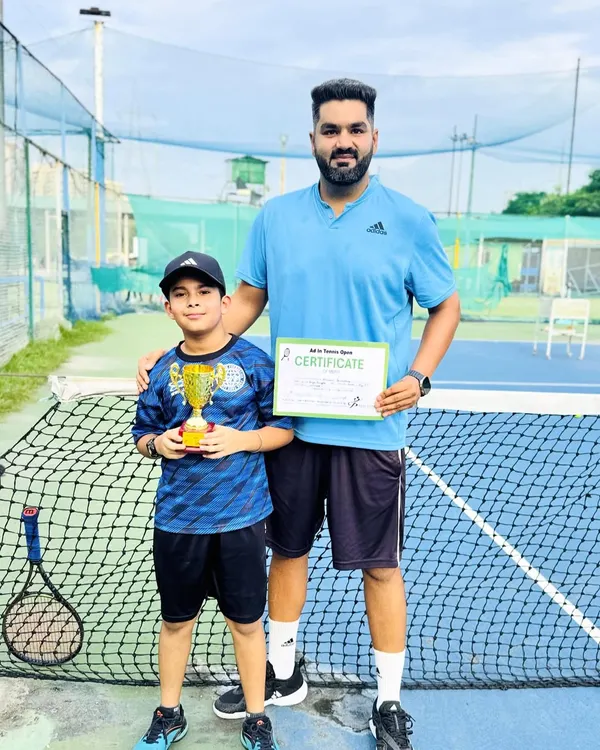 Here is one of our youngest champions, Aabaan Sachdeva, after winning the Under-10 singles title at just 8.5 years old. Our beginner's program focuses on building strong fundamentals and a love for the game.