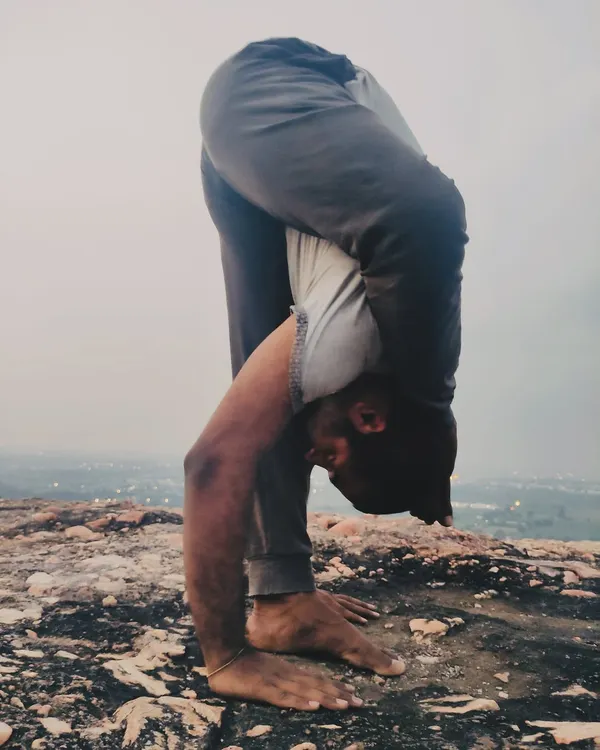 In a deep forward fold like Uttanasana, we practice Dharana, the art of concentration. It is about letting go of distractions and bringing the mind to a single point of focus.