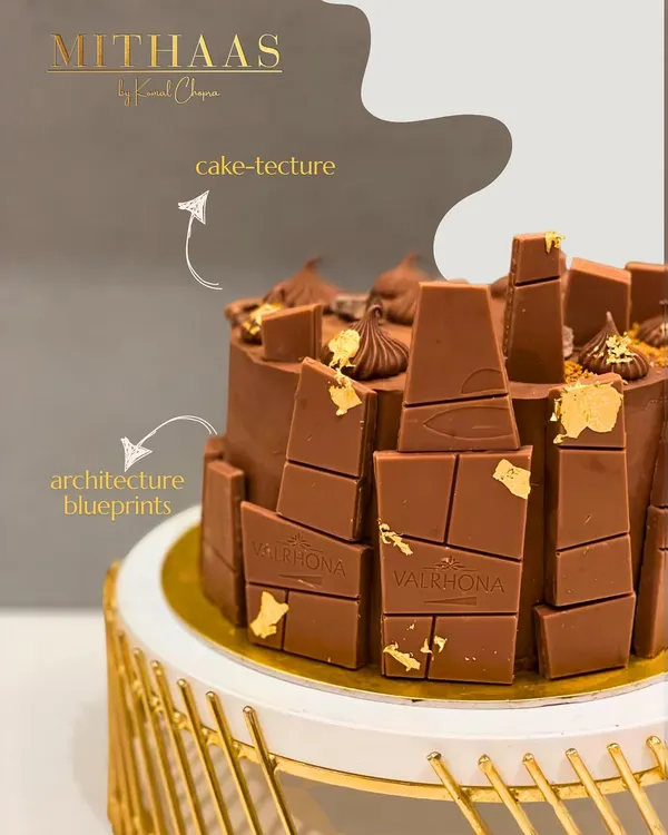 I designed this special "cake-tecture" cake for an architect friend. The design mimics architectural blueprints using Valrhona chocolate bars, creating a personal and artistic tribute to their craft.