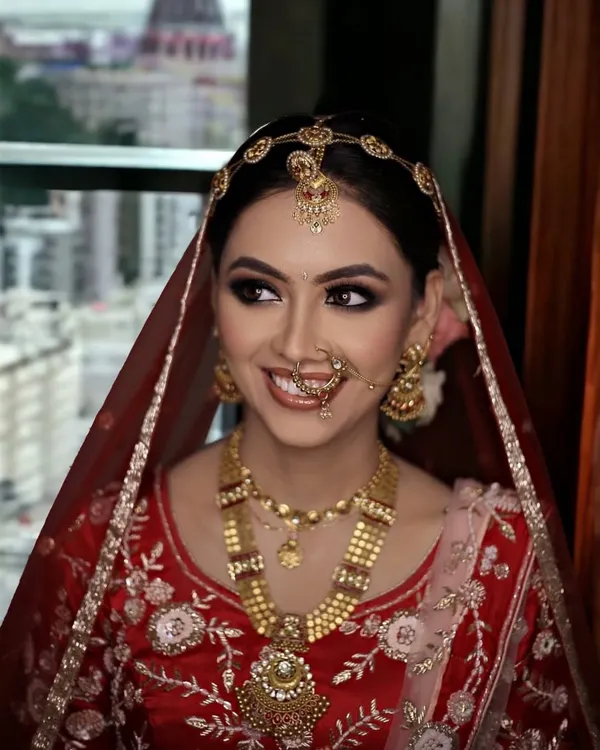 This is the moment every bride dreams of. I created this timeless look with classic smokey eyes and radiant skin, ensuring she felt as stunning as she looked on her wedding day.