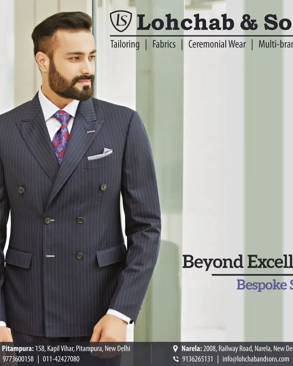 Our bespoke suits go beyond excellence. This double-breasted pinstripe suit is a perfect example of our custom tailoring, crafted to provide a powerful silhouette and a flawless fit for the modern professional.