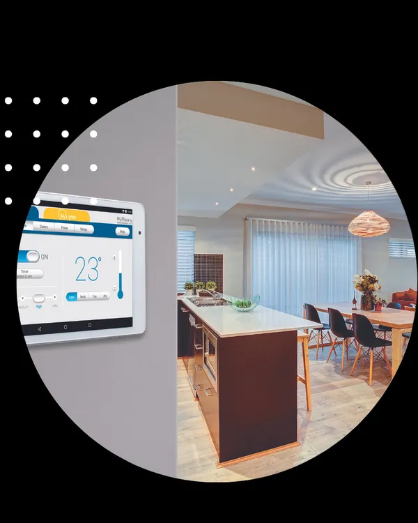 We install wall-mounted touchscreens that provide a centralized view of your home's climate. This panel in a modern kitchen shows the current temperature at 23 degrees Celsius, with easy access to adjust settings for the entire zone.