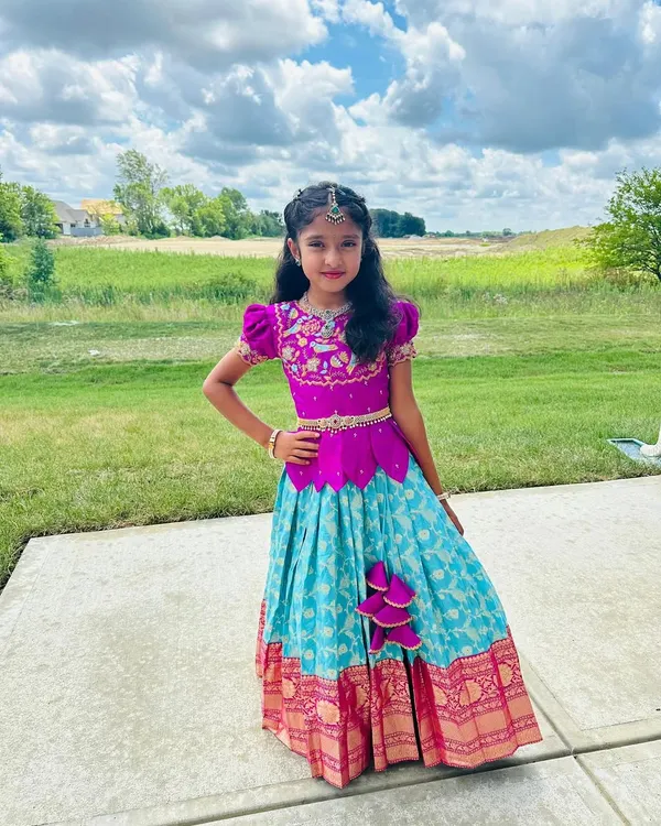 This is what it's all about. Seeing a happy child feeling beautiful and confident in one of my custom-designed Banarasi Pattu lehengas makes every stitch worthwhile.