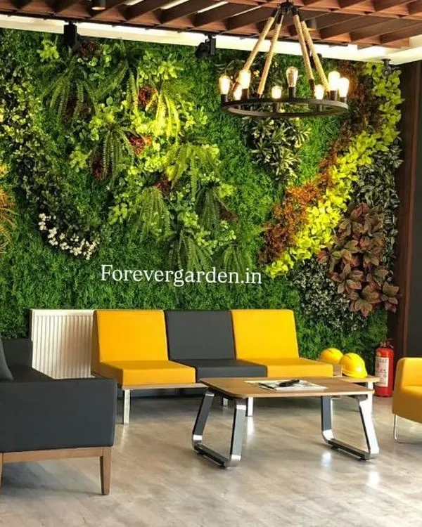 A vibrant, multi-textured artificial green wall brings life and color to this modern office reception area. This installation serves as a stunning, maintenance-free art piece that enhances the corporate environment.