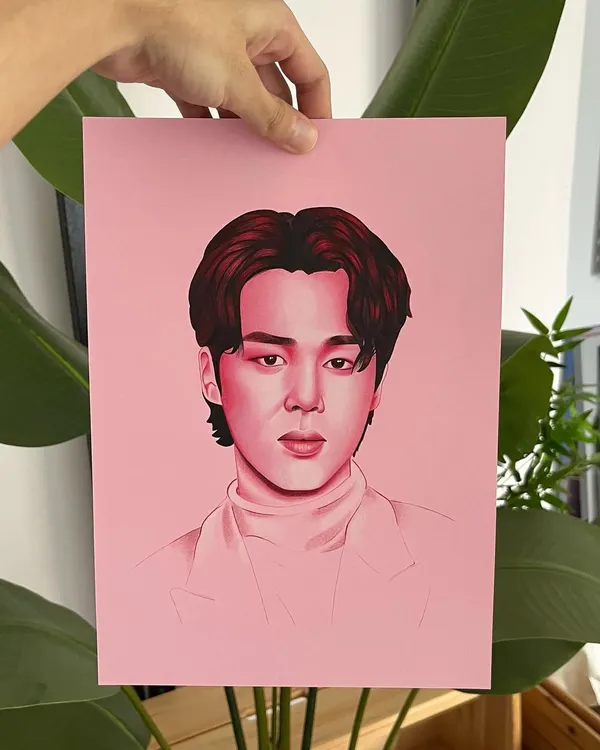A monochromatic portrait of Jimin from BTS. Using a limited palette of reds and pinks on toned paper allows me to create a really focused and artistic piece.