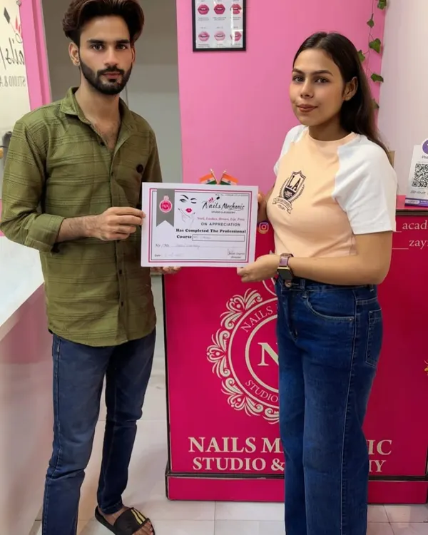Another proud moment as a student completes her professional nail course. This certificate is proof of her hard work and readiness for the industry.