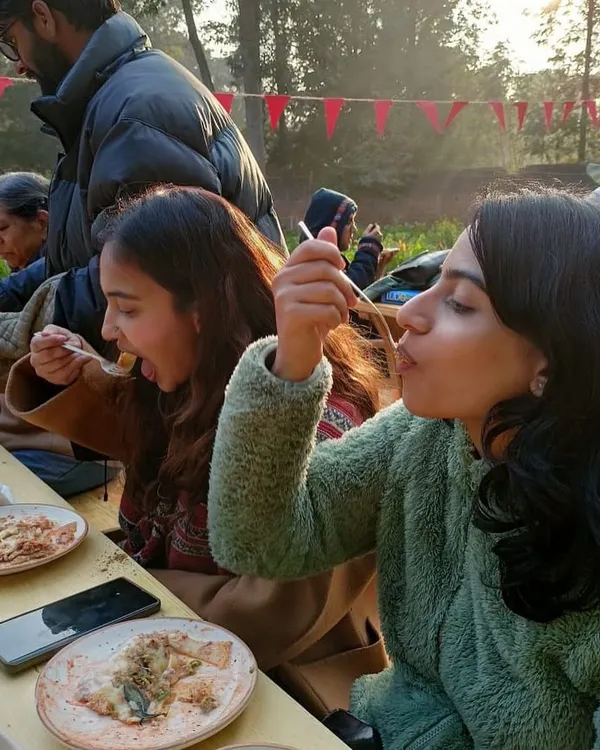 There's nothing like sharing a meal made with love and fresh ingredients. Our guests enjoying a farm-fresh pasta and salad, right in the heart of where it was grown.