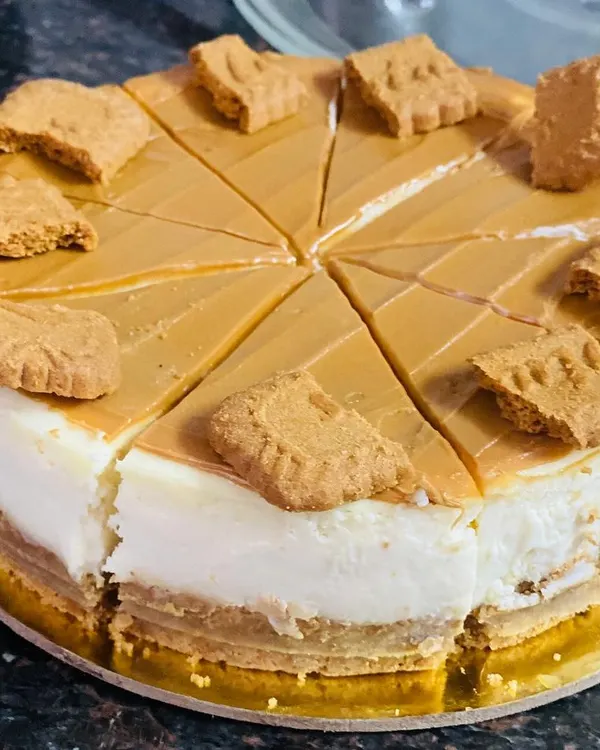 My eggless Lotus Biscoff cheesecake is pure decadence. It features a creamy baked cheesecake on a Biscoff crust, topped with a layer of Biscoff spread and garnished with whole biscuits.