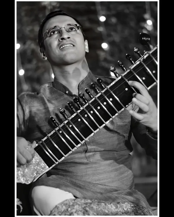 Lost in the music during a performance. This black and white photograph captures the moment of complete immersion in the Raag.