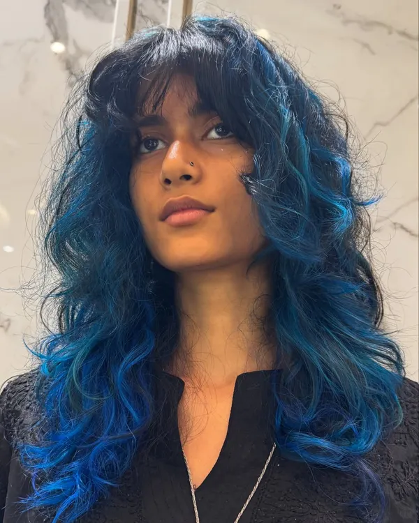 Blue hair fun! A close-up of this vibrant blue look, showing the texture and layers.