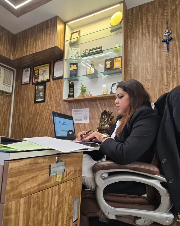 Late hours at the office, deep in case preparation. The path to progress is paved with struggle and hard work, and I am committed to putting in the effort for every client.