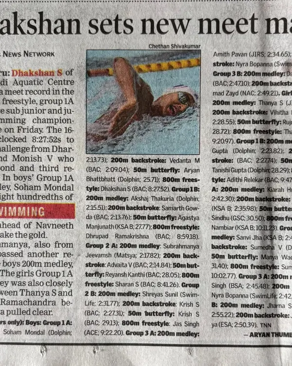 A Times News Network article highlighting Dhakshan S setting a new meet record in the 800m freestyle.