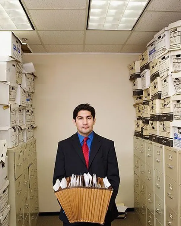 Does your office look like this? Overcrowded file rooms can slow down productivity and create unnecessary stress. We offer a simple way to offload non-essential paperwork and reclaim your workspace.