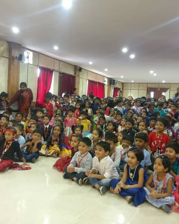 A hall full of excited children at Auden Public School, completely captivated by the puppet show. We love performing for school events.