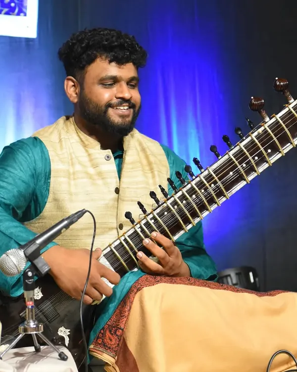 A happy moment from a live classical concert. Performing on stage is a joy, and this experience helps me bring energy and precision to live band studio recordings.