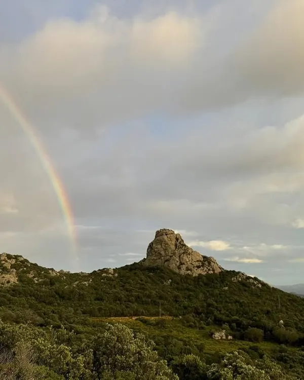 A rainbow graces the sky over the hills of Sardinia, Italy, the location for one of our international yoga retreats. Practicing in such pristine natural environments is a blessing.
