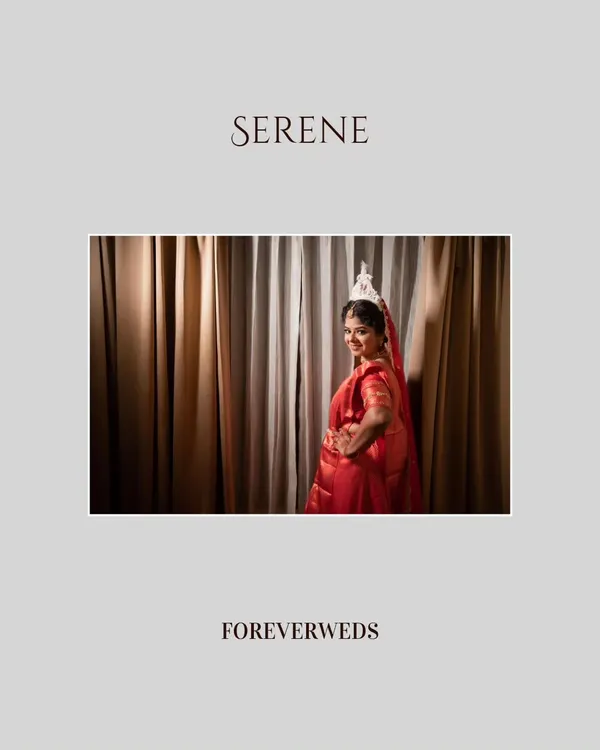 Serene and graceful. This portrait of Bhawana, a beautiful Bengali bride, was taken in a quiet moment before her ceremony. The soft lighting and simple background highlight her traditional attire and calm demeanor.