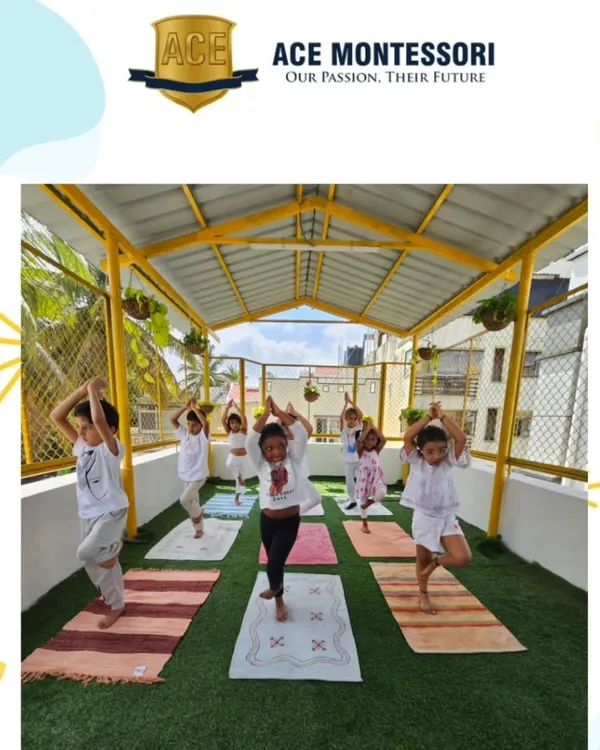 Children practice the tree pose during our rooftop yoga session. Yoga helps them develop balance, flexibility, and a sense of inner calm.