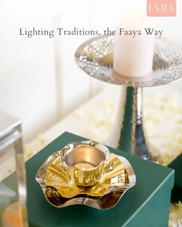 Some traditions never lose their glow. This image captures the essence of our diya collection, featuring a hammered gold diya and a silver candle stand, pieces made to honour rituals and elevate your Diwali celebrations.