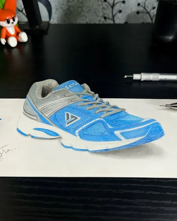 This running shoe is a 3D drawing created with colored pencils and markers. I'll show you the secrets of shadow and perspective to create your own mind-bending 3D art.