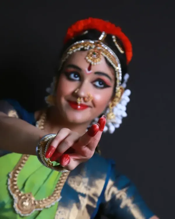 The grace and expression of a young Bharatanatyam dancer during her pre-Arangetram photoshoot. I love documenting unique cultural milestones, focusing on the dedication and artistry involved.