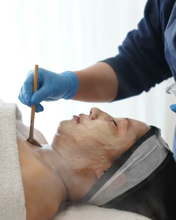 Timeless beauty deserves timeless care. My Age-Defying Facial includes the application of a specialized mask with a brush to ensure even coverage over the face and neck.