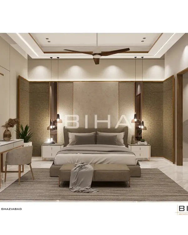 This master bedroom design features a rich interplay of textures, from the upholstered headboard to the contrasting wood-grain panels. Pendant lights hang low over the bedside tables, providing focused task lighting, while a dedicated study nook with a sleek desk offers a functional workspace within the tranquil environment.