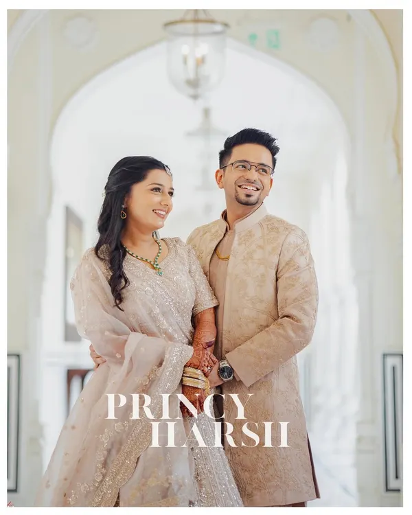Princy and Harsh share a joyful moment during their engagement shoot in Jaipur. We focus on capturing the genuine smiles and laughter that make your celebration uniquely yours, all within a classic, elegant setting.