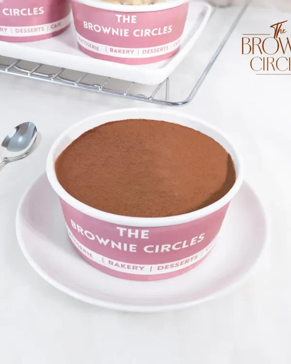 Our authentic Tiramisu Tub is a customer favorite for a reason. We layer coffee-soaked sponge fingers with a light and creamy mascarpone mixture, finished with a generous dusting of cocoa powder.