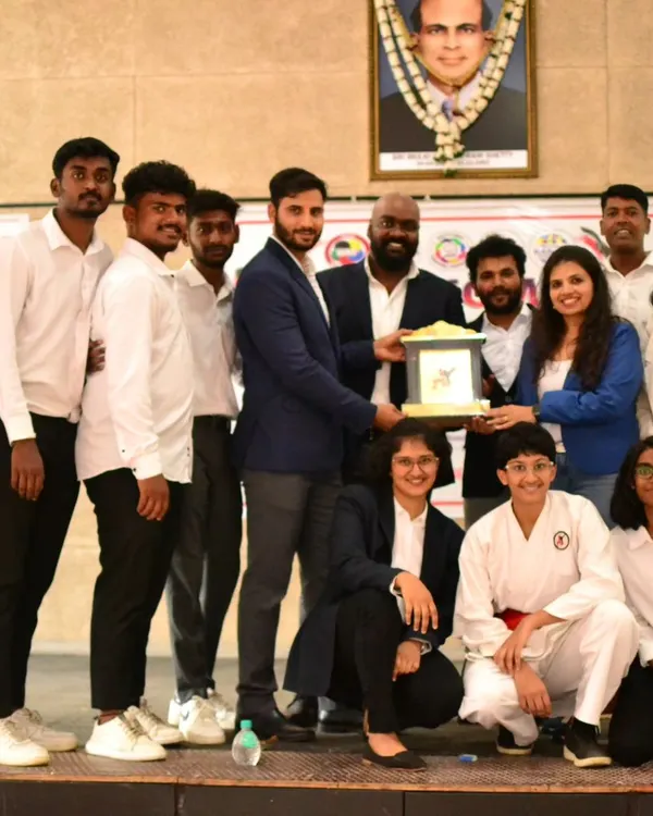 Our team and I receiving a token of appreciation after our first National Level Karate Tournament. These events are a huge team effort and a success for our entire community.