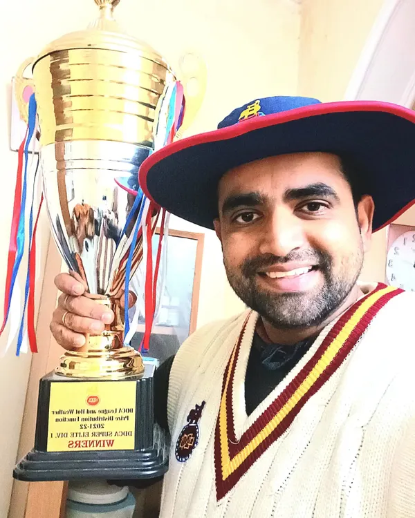 Holding the DDCA Super Elite Division championship trophy. This is a symbol of our club's journey and resurgence, a proud moment for every player who has been part of our fight to the top.
