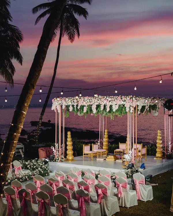 A fairytale mandap set against a dramatic Goan sunset. I believe in creating moments that feel like they're straight out of a dream, and this beachside wedding ceremony was nothing short of magical.