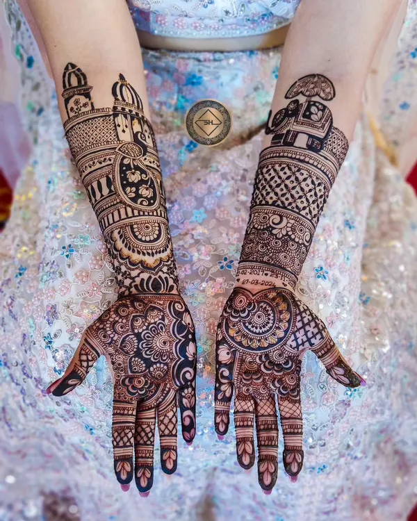 This is a great example of a fully customized Indian bridal henna design. The bride wanted to include traditional elements like a decorated elephant and a lotus mandala, but also a grand palace to represent her fairytale wedding. I love bringing these unique stories to life.