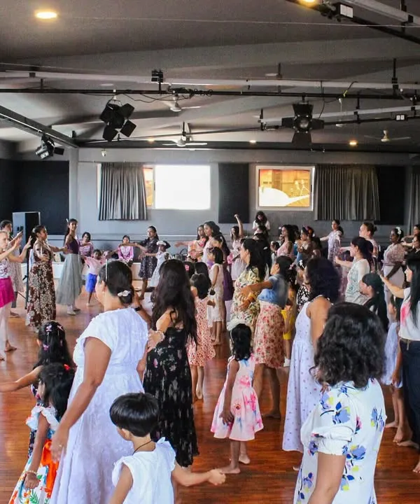 A wide shot of our Mother's Day celebration, with the studio full of students, mothers, and siblings all dancing together. It was a day filled with love and shared movement.