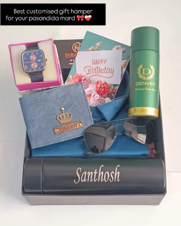 This is what a perfect birthday surprise looks like. This complete gift hamper includes a personalized watch, a custom name wallet, a name-engraved flask, a branded shirt, and a Denver deodorant, all beautifully arranged in a premium gift box.
