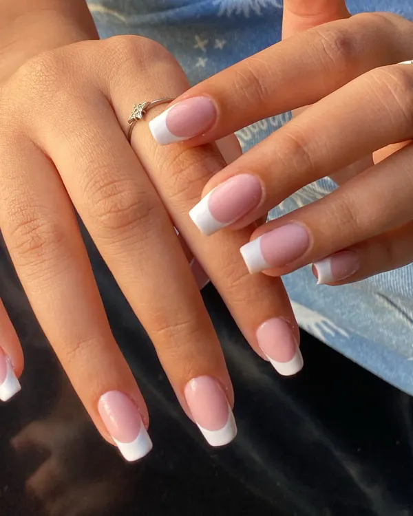 You can never go wrong with a classic. A perfect, crisp white French manicure on clean, square-shaped gel extensions.