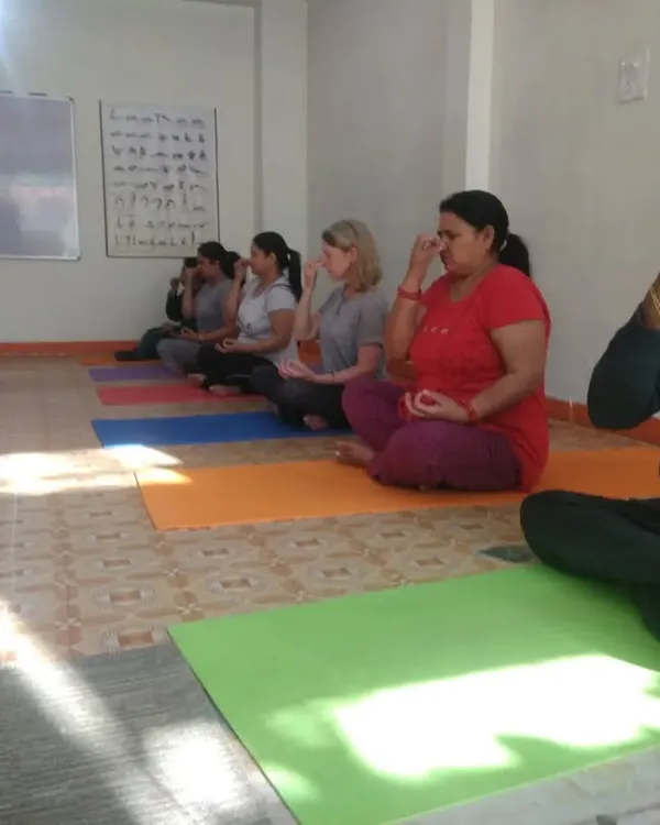 A group of students practicing Anulom Vilom (Alternate Nostril Breathing) at my Aryan Yogshala studio. This pranayama technique is fundamental for calming the mind, balancing energy, and improving respiratory function.