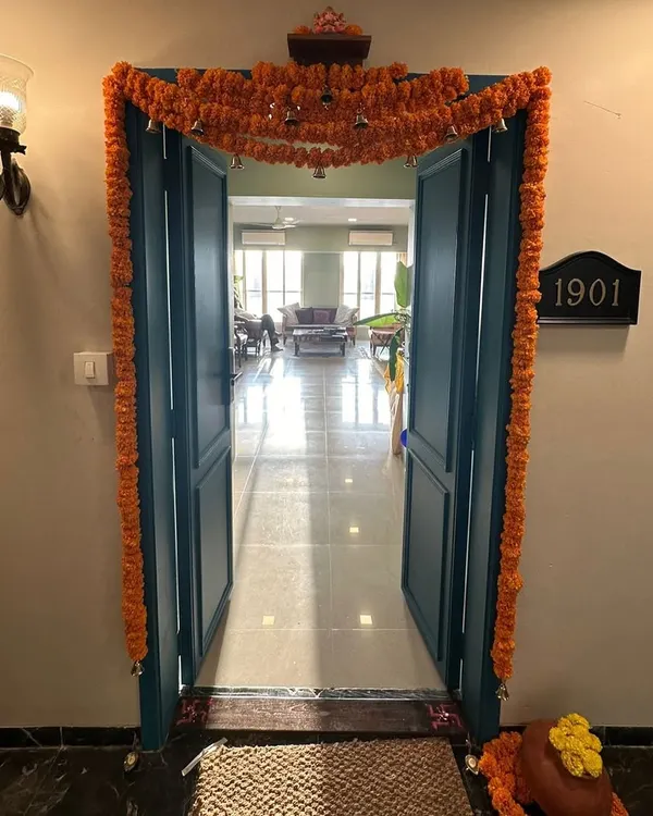 The entrance to my home during Ganesh Chaturthi, decorated with simple, eco-friendly marigold garlands. I believe celebrations can be beautiful, traditional, and completely green, without waste or plastics.