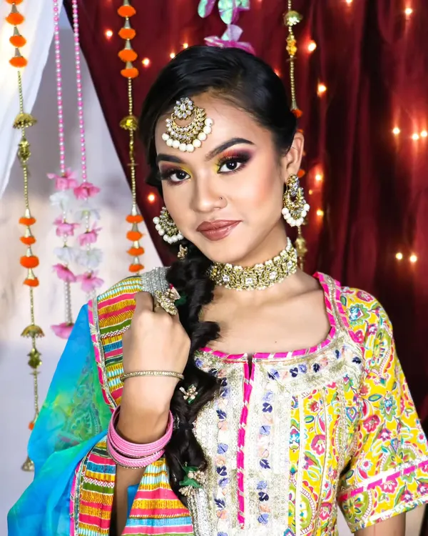 A beautiful and bold rainbow eyeshadow look, perfect for a bride who wants to experiment and have fun with her Haldi or Mehndi makeup.