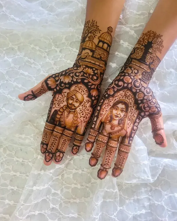 This is what I love to do most: telling your unique story. This full bridal henna features custom portraits of the couple, surrounded by intricate floral and traditional patterns, with a special nod to the Gurudwara on the wrist.
